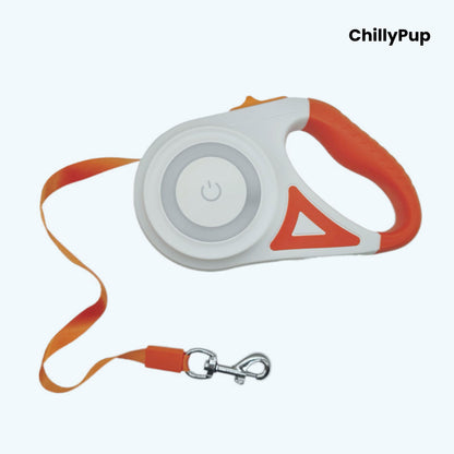 Retractable dog Lead with Orange handle and grey strap on a white background, branded 'ChillyPup'.